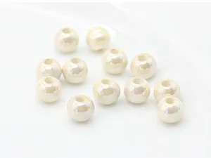 Detailed view of ceramic round beads, DIY jewelry accessories, white porcelain spacer beads.