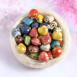Colorful ceramic heart beads for DIY jewelry making, handmade bracelets and accessories display.