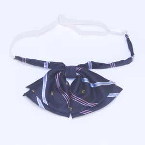 Japanese JK uniform bow tie with navy blue stripes and crown pattern, adjustable elastic strap.