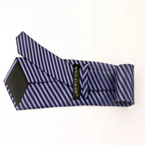 Detailed view of the blue and purple striped polyester necktie, showing fine jacquard texture and label.