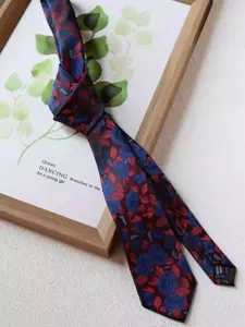 Vintage floral necktie for men, 8cm wide classic retro design for business, weddings and formal wear.