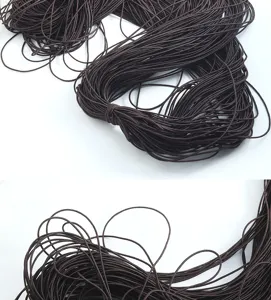 Vista detallada del cordón elástico marrón, 1.2mm redondo para pulseras de cuentas hechas a mano.