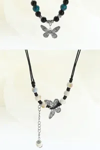 Detailed view of the new Chinese style butterfly necklace featuring ceramic beads and charms.