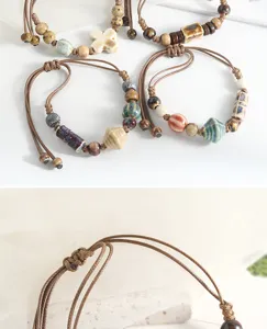 Handcrafted ceramic beaded bracelet with braided cord, showcasing retro ethnic design details.