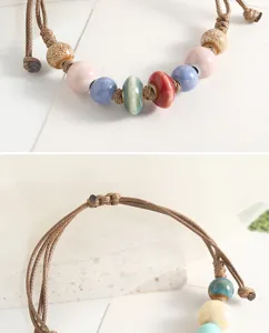 Vintage ethnic handmade ceramic beaded bracelet with braided cord, detailed product view.