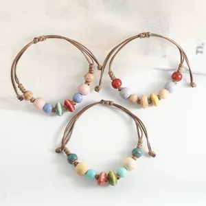 Handmade retro ethnic ceramic beaded bracelet set, unique braided rope jewelry for daily wear.