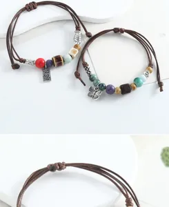 Handmade woven ceramic bracelet detail with colorful beads and cute charms for a fresh style.