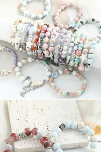Nuovo set di braccialetti di perle in ceramica cinese con ciondoli a stella marina.