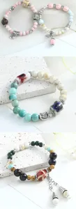 Detailed view of Chinese style ceramic beaded bracelets with retro charms and fresh pastel tones.
