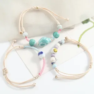 Handcrafted braided cord ceramic beaded bracelet set, artistic couple jewelry for daily wear.