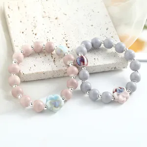 Nuovo braccialetto di perle in ceramica cinese, grazioso gioiello da donna chic
