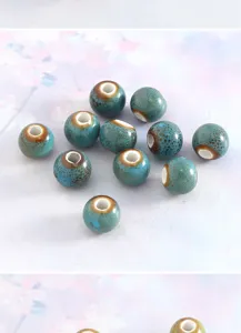 Detailed closeup of handmade blue crackle glaze ceramic beads, perfect for DIY jewelry making.