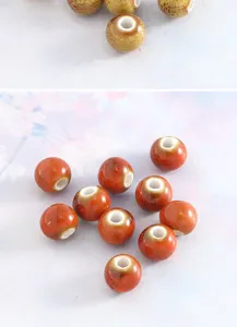 Close-up detail of glazed ceramic round loose beads, perfect for DIY jewelry crafting.