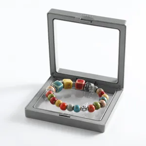 Transparent PE film floating jewelry storage box for necklaces and bracelets display.