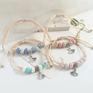 Fresh ceramic beaded woven bracelet set with metal ginkgo leaf pendant for women daily gift.