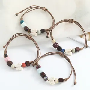 Boho ceramic butterfly beaded bracelet set, minimalist woven string jewelry for women.