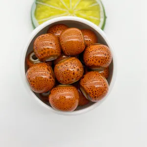 12mm leopard print ceramic beads detail view, perfect for DIY jewelry making, bracelets and necklaces.