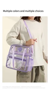 Clear PVC tote bag detail view showing transparent body, purple straps, and pockets.