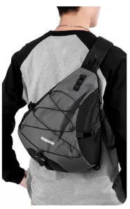 Detail view of the durable nylon sling backpack with bungee cord design and zipper pocket.