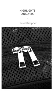 Detailed view of the smooth metal zipper and breathable mesh material on the black travel backpack.