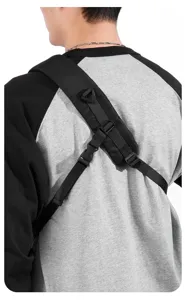 Close-up detail of adjustable black nylon strap and sturdy buckle on outdoor chest bag.