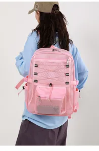 Pink mesh hollow backpack, breathable travel sports daypack with multiple zipper pockets.