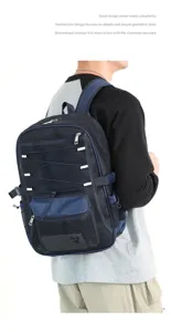 Breathable mesh backpack for travel and fitness, dark blue casual daypack with elastic cords.