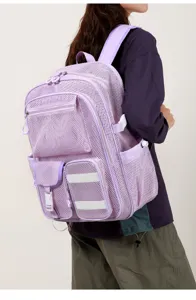 Grande zaino in rete con tasche multiple, perfetto per scuola, viaggi e uso quotidiano.