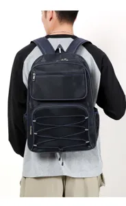 Detailed back view of a breathable mesh backpack in dark blue, showing straps and pockets.