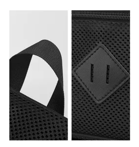 Close-up detail of black mesh backpack showing breathable fabric and leather diamond patch.