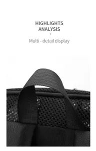Vue en gros plan de la poignée supérieure et de la structure en tissu mesh du sac à dos.