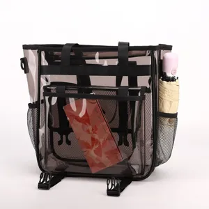 Clear PVC tote bag for beach travel, waterproof transparent shoulder bag with mesh pockets.