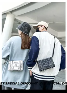 Detailed view of the 2D cartoon style messenger bag worn by models outdoors, stylish accessory.