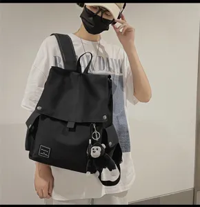 Casual canvas backpack with flap, multi-pocket design, stylish school bag with cute monkey.
