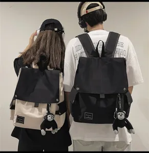 Casual canvas backpack with cute monkey keychain stylish school bag for men and women