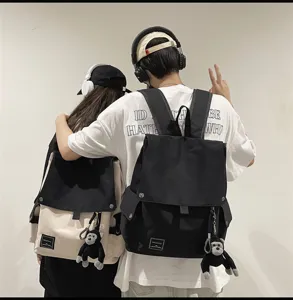 Casual canvas backpack for students, minimalist flap school bag for teen boys and girls, daily.