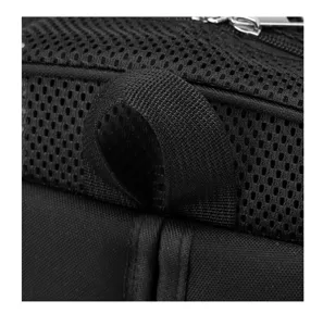 Close-up detail of black mesh backpack showing breathable mesh fabric and durable webbing loop.