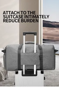 Detailed shot of grey travel duffel bag mounted securely on suitcase handle for easy carrying.
