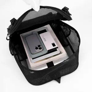 Black mesh backpack for outdoor sports, breathable hollow design with large capacity storage.