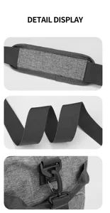 Detailed view of the foldable travel duffel bag showing durable grey fabric and strong strap buckles.