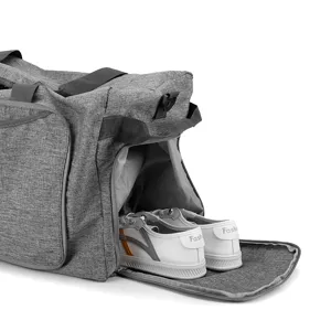 Large capacity grey foldable travel duffel bag with separate shoe compartment for gym.