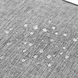 Waterproof grey storage bag fabric close-up, durable foldable travel organizer material.