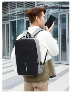 Men business laptop backpack with USB charging port, durable oxford cloth casual travel daypack.