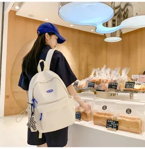 Lässiger Canvas Rucksack für Damen große Kapazität Schultasche einfache einfarbige Studententasche.