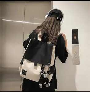 Casual canvas backpack with monkey pendant black and white school bag for students