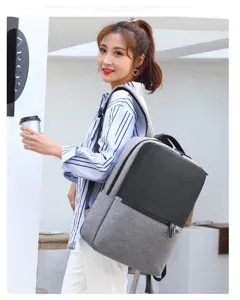 Detail view of the business laptop backpack featuring dual-tone grey and black design.