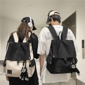 Casual canvas backpack for men and women stylish campus school bag with flap and cute monkey pendant.
