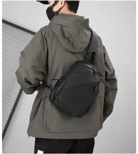 Men's waterproof leatherette crossbody chest bag, tactical sling bag for street style.