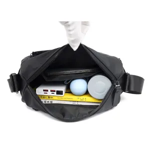 Men's waterproof PU messenger bag, large capacity crossbody bag showing interior storage space.