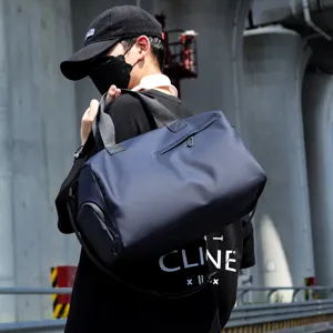 Waterproof duffel bag for travel and gym, large capacity dry wet separation sports bag for men.